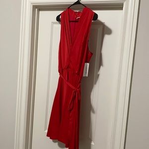 Women’s red sleeveless dress with tie at waist